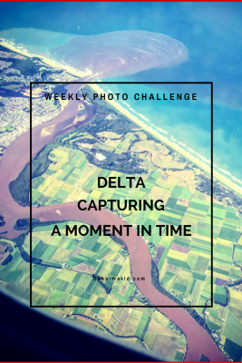 Weekly photo challenge post featuring the mouth of a river as taken from a plane for the theme of delta